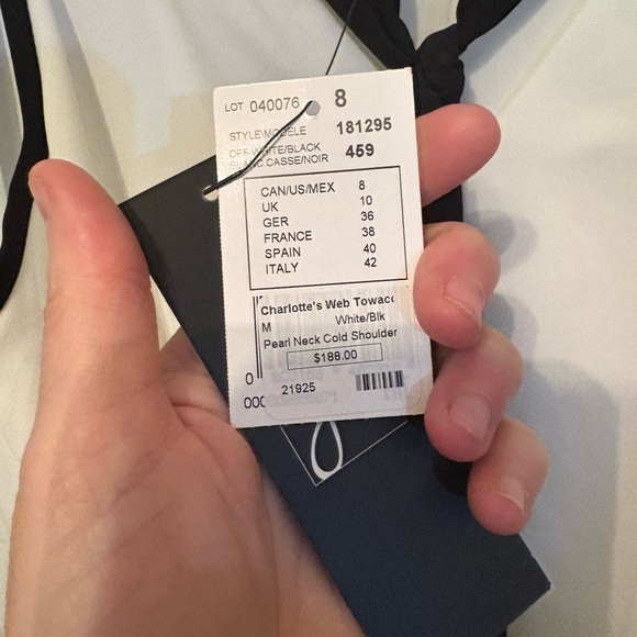 White Sleeveless Top with Black Tie Accent - Picture 5 of 6